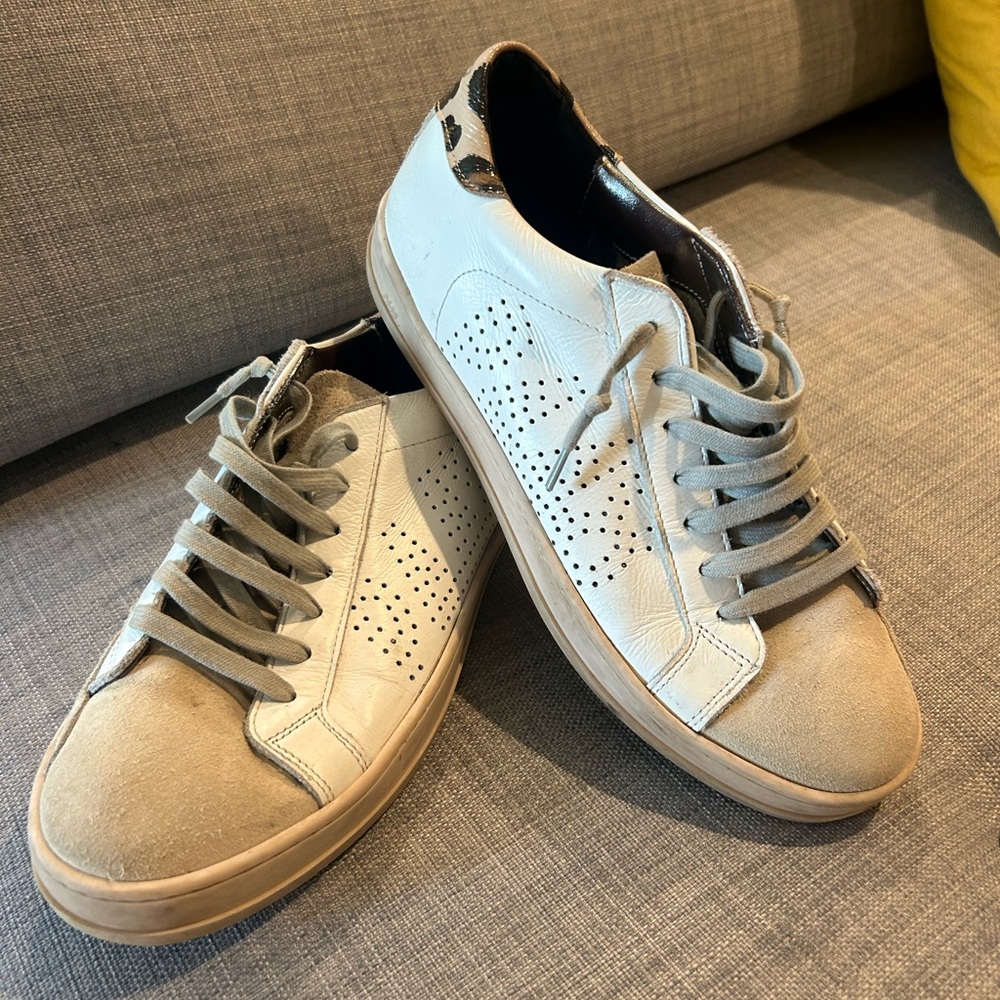 P448 white sneakers with a little cheetah design on the back
